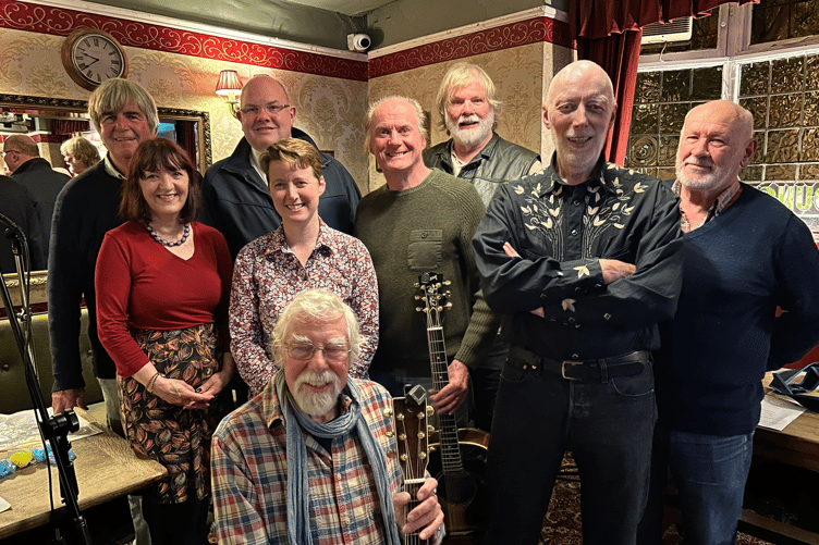 Malcolm Adams, back left, organised the event in aid of the Salvation Army