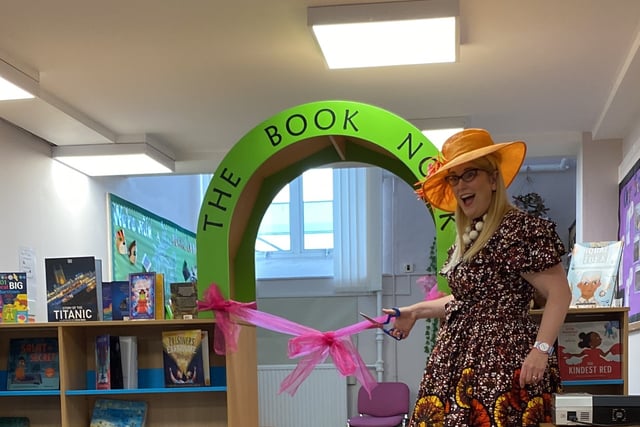 Author opens restocked school library