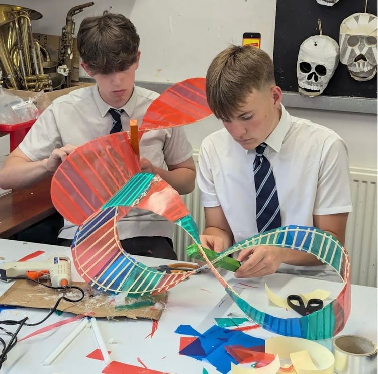 Coombeshead Academy students create Remembrance Day memorial.