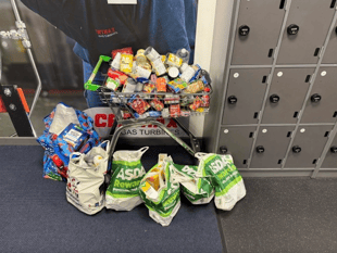 Students spread festive cheer with food bank donations 