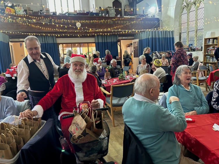 Father Christmas visits festive diners at the Strand Centre in Dawlish.