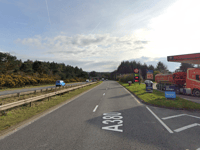 A38 at standstill after motorbike and tractor crash