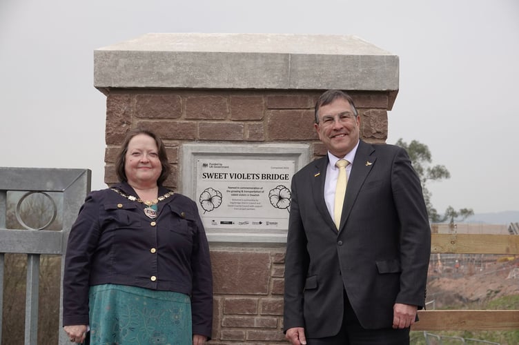 Mayor of Dawlish Lin Goodman-Bradbury with MP Martin Wrigley on the newly named Sweet Violets Bridge in Dawlish. Photo Bob Simpson 