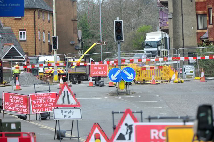 Highweek Street, Newton Abbot.  Gas main works continue to plague drivers around the town