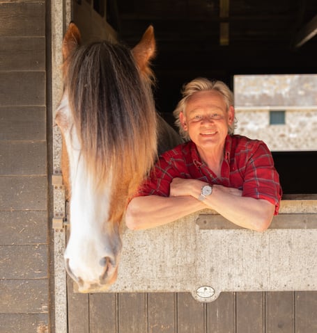 Martin Clunes is the special guest due to open the Devon County Show heavy horse festival in May. The actor is pictured with his own Clydesdale horse Patrick.