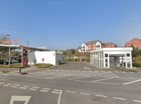 Firefighters' charity car wash at supermarket 