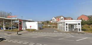 Firefighters' charity car wash at supermarket 
