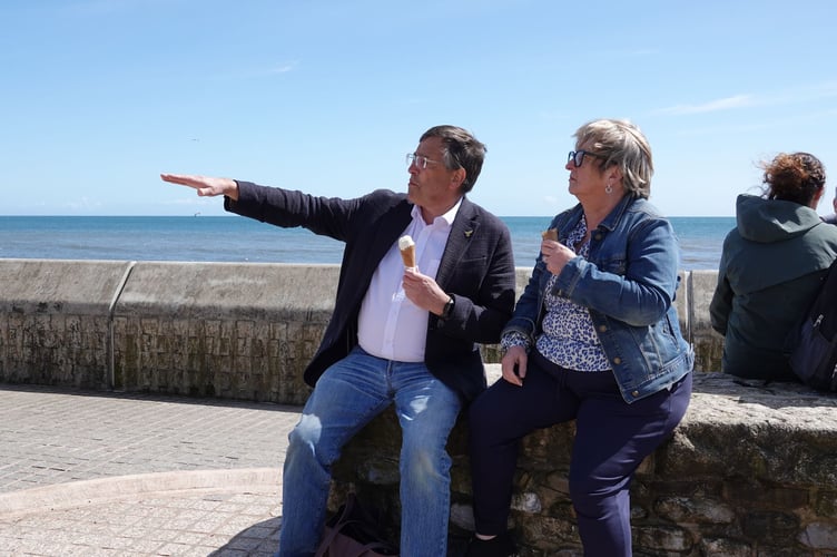 MPs Martin Wrigley and Christine Jardine enjoy an ice cream at Dawlish sea wall on the election campaign trail. PHOTO BOB SIMPSON 