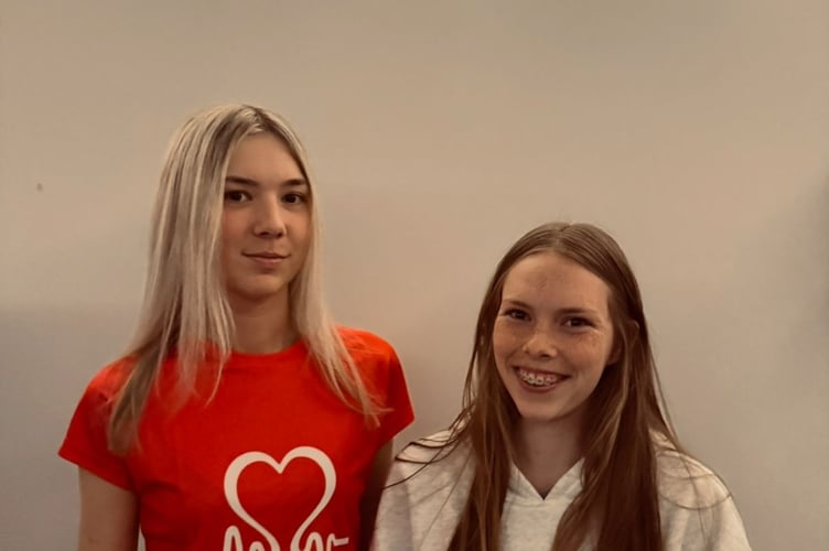 Megan Preece-Bishop, 19, from Teignmouth, running the London Marathon, with her younger sister Ella