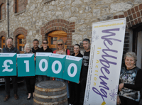 House builders' £1,000 donation to Newton Abbot charity 