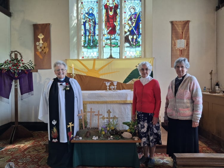 Celebrating the 80th anniversary of St George's Church Holcombe are, left to right, Rector of the Dawlish Coast Mission Community, Revd Linda Cronin. and former vicars of St George's Revd Helen Bays and Preb Chris Curd. Photo Lin Goodman-Bradbury