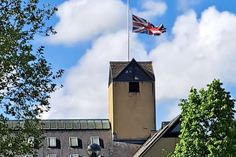 Union flag being flown at half mast at Teignbridge Council headquarters for the 80th anniversary of VE Day. Photo TDC 