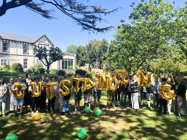 Staff and students at Oakwood College in Dawlish celebrate glowing Ofsted report.