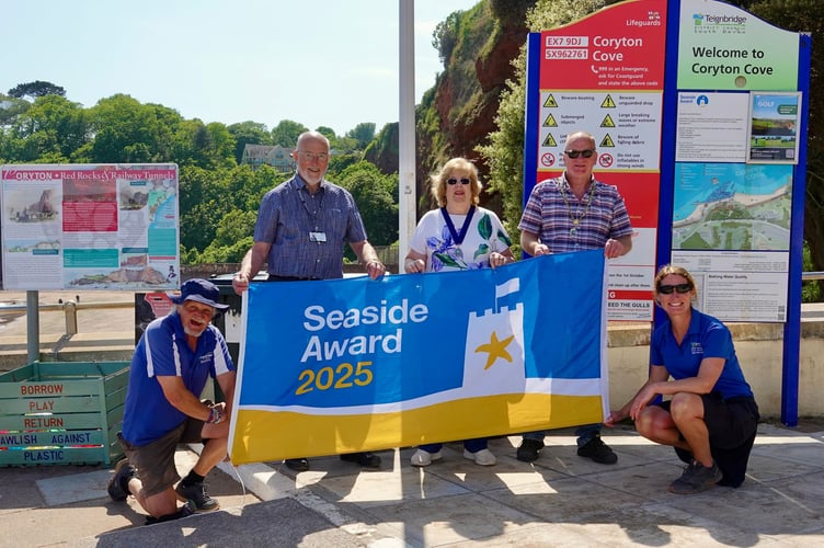 Seaside Award at Coryton Cove with Mayor Cllr Anthony James, Deputy Mayor Cllr Lynda Littlewood, Cllr John Nutley from Teignbridge Council, Sarah Holgate, resort manager, and resort attendant David Prior. Photo Bob Simpson