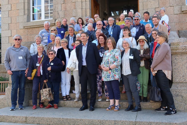 Twinning friends from Teignmouth and Perros-Guirec pictured at the steps of Perros-Guirec town hall. Photo ALISON THOMAS