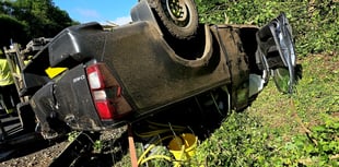 Overturned truck and garage crash... all in a day's work for fire crew