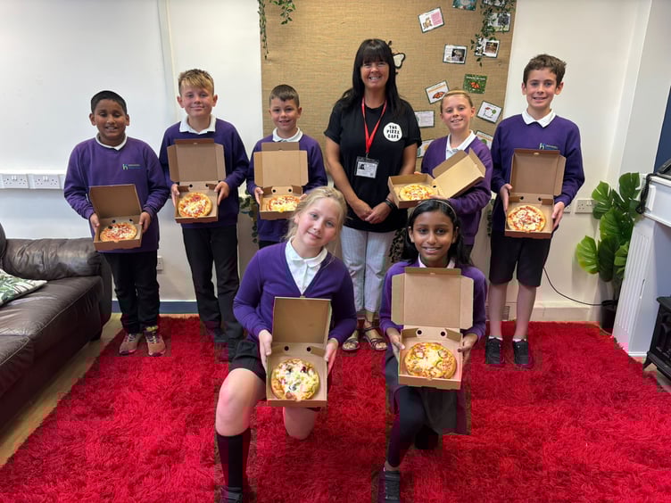 Children from Highweek Primary School made their own pizzas thanks to staff from the Pizza Cafe.