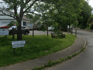 Occupants flee after car crashes into village wall 