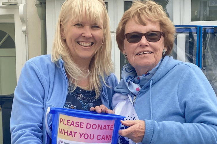 Former Chairman of the committee, Gill Willis, right, and her daughter Sarah, who ran the tombola stall.
