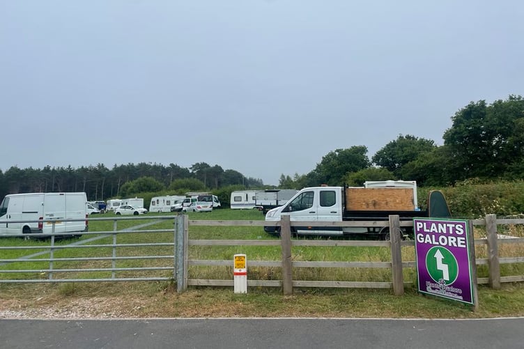 The group of travellers have encamped in a field near Plants Galore, Newton Abbot