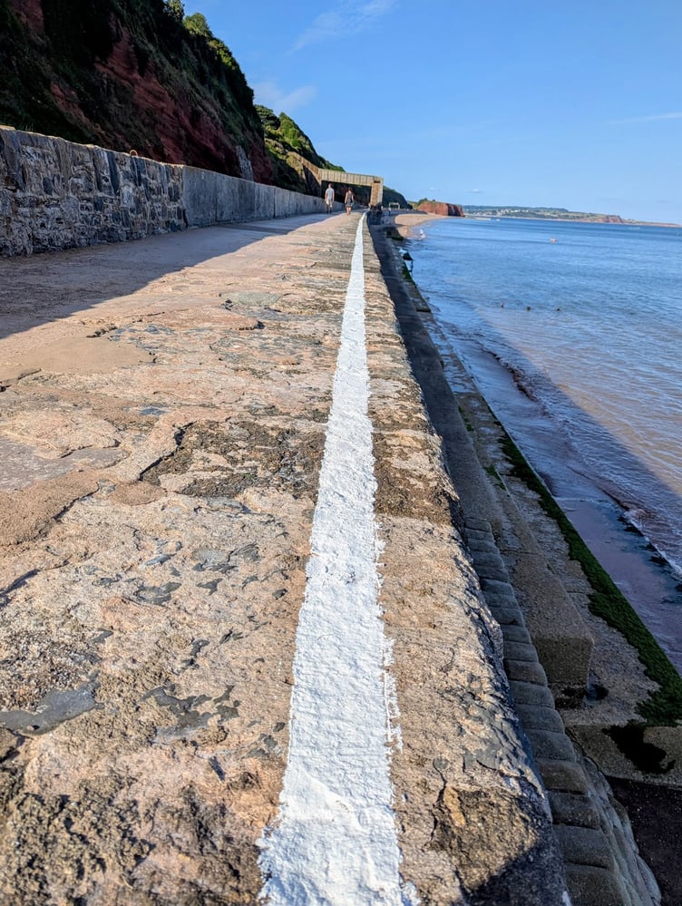New white line has been painted along Dawlish sea wall. Photo Eyes of Dawlish