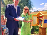 Villagers' celebrate new community library opening
