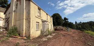Council reject plan to build homes on fire-ravaged manor house site