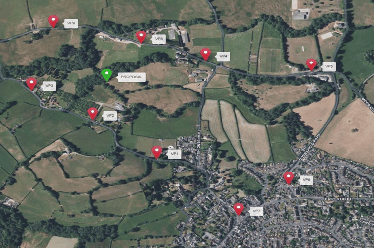 The green marker represents the proposed site