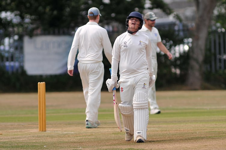 Devon Cricket League C Division West.  South Devon 1st XI versus Ipplepen 2nd XI. Pen's batsman Warrick Green heads back to the pavilion having been caught by Mali Marshall off a ball from Jack Allen.

Ipplepen won the toss and elected to bat making 192 all out after 41.5 overs. South Devon took to the crease and scored 193/7 in 42 overs giving them a three wicket run