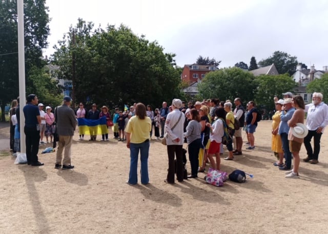 Raising the flag on Ukrainian Independence Day in Dawlish. Photo Noreen Goodchild