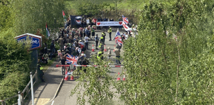 Leader issues ‘define by actions’ plea over asylum hotel protests