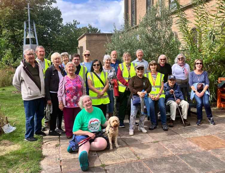 Westbank's Debbie Hutchinson, her dog Aroha and their walking companions at St Sidwell's in Exeter (photo by Sharon Goble)