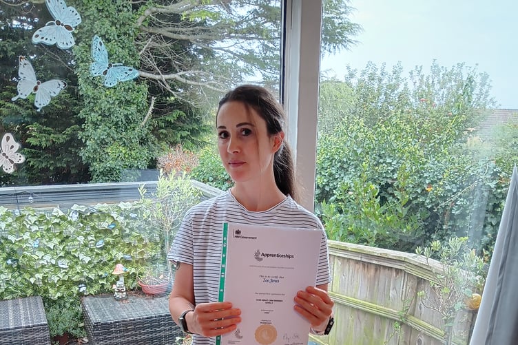 Zoe Jones, a senior support worker at The Holt, with her certificate.