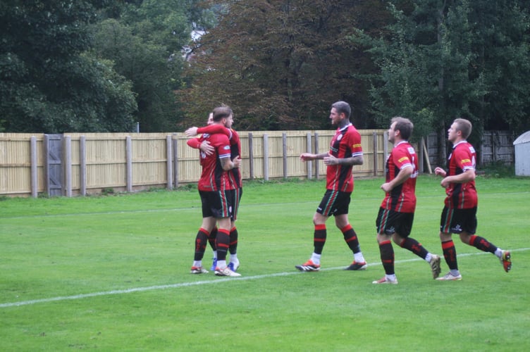 Bovey Tracey celebrate Owen Stockton's opener against Oke Argyle
