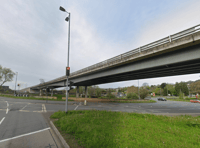 Man, 20s, arrested after throwing objects into traffic from bridge