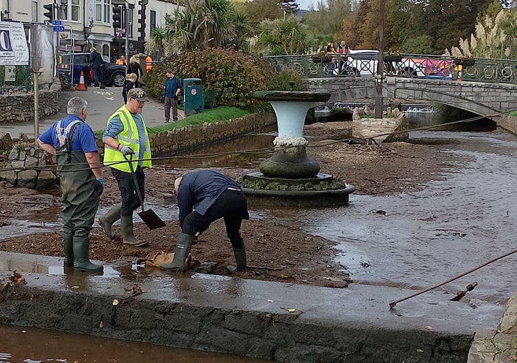 WADE volunteers in action in Dawlish ahead of storm. Photo Noreen Goodchild