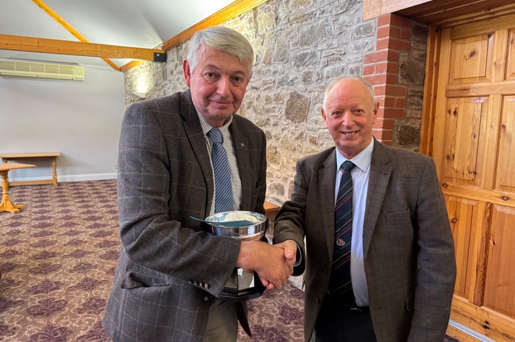 Alan Bickley won the Devon Multi-furrow trophy, presented by President Raymond Govier. AQ 7131