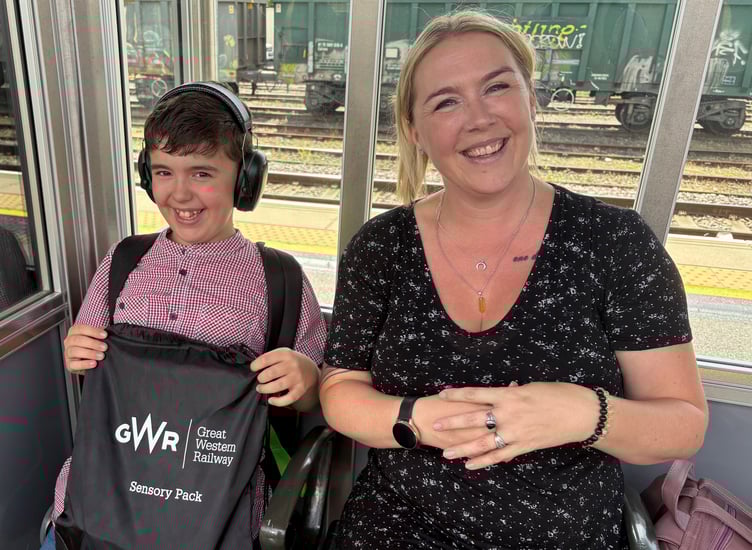Brodie Pollock, 11, has benefitted from GWR’s autism-friendly initiatives, travelling on the train regularly with his parents, Richard, a driver depot manager, and Hayley. Photo GWR