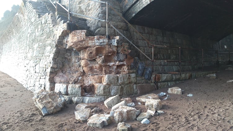 The damaged steps at the Smugglers Lane end of the sea wall at Holcombe.
