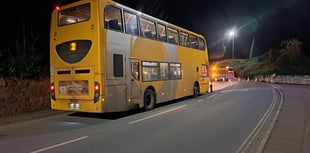 Bus stranded at road closure 
