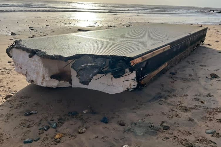 The pontoon washed up at Dawlish Warren which has broken up due to strong waves. Photo Dawlish Warren Facebook