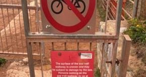 New signs at Dawlish sea wall aim to stop cyclists