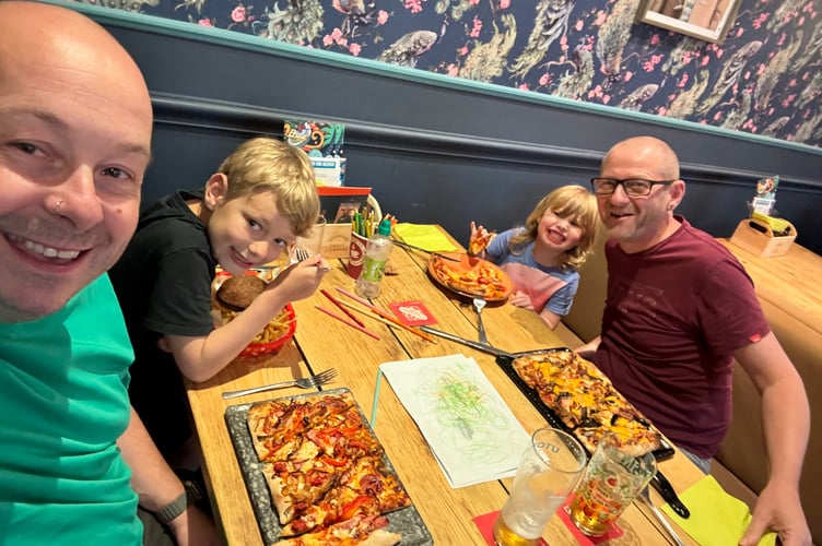 Dan Boxall-Simpson, left, of EPIC Family CIC and his family.