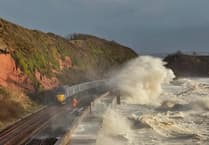 Watch: Waves crash onto railway line at Dawlish