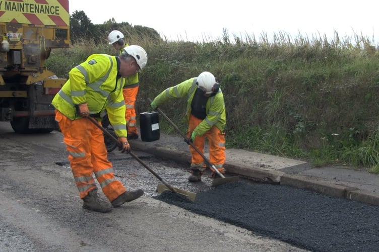 A pothole being repaired. Picture: DCC