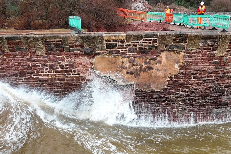 Fencing now on Dawlish sea wall while repairs are carried out. Photo South West Rail Resilience Programme