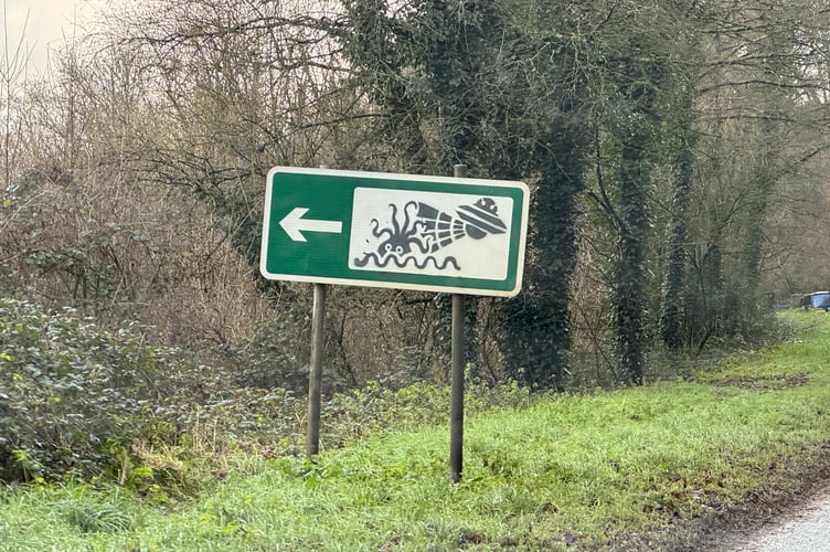 The most talked about graffitied road sign in Devon is located on the A377 between Crediton and Exeter.  AQ 2042
