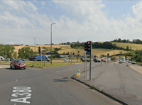 Biker checked over by ambulance crew after Hamelin Way collision 