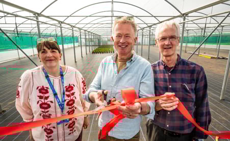 Left to right: Della Norris, Vocational Services Manager, Toby Buckland, celebrity gardener and Trevor Moir, Clinical Service Manager at the new polytunnels. Photo: GRW Photography