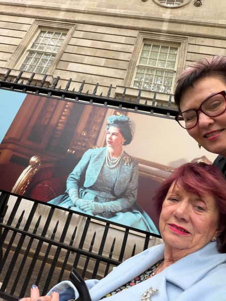 Sheila Thomas and daughter Cathy Robbins at Buckingham Palace. Photo contributed 